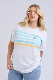 A model wearing the Line Up Tee in colour Marshmello (White), from the front, cropped image