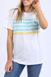 A model wearing the Line Up Tee in colour Marshmello (White), from the front, cropped image
