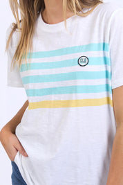 A model wearing the Line Up Tee in colour Marshmello (White), from the front, cropped image