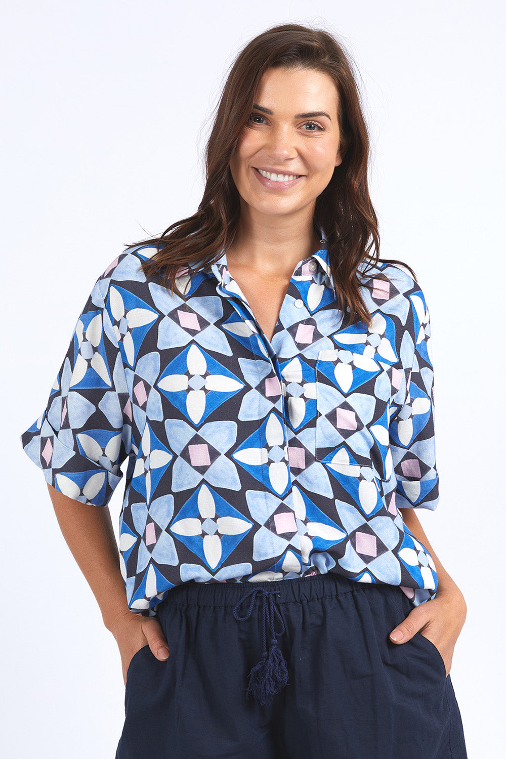 A model wearing the Painted Tile Linen Blend Shirt in colour Geoprint (Blue), from the front, cropped image