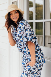 A model wearing the Painted Tile Linen Blend Shirt in colour Geoprint (Blue), from the front, showing the whole outfit