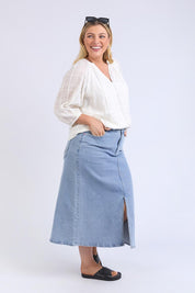A model wearing the Isabella Cotton Blend Blouse in colour Marshmello, from the front, showing the whole outfit