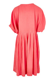 Product shot of the Bliss Relaxed Lyocell Linen Dress in colour Watermelon (Pink), from the back