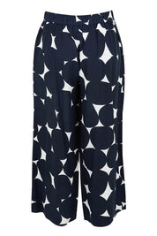 Product shot of the Demi Spot Lyocell Linen Pant in colour Spotprint (Blue), from the back