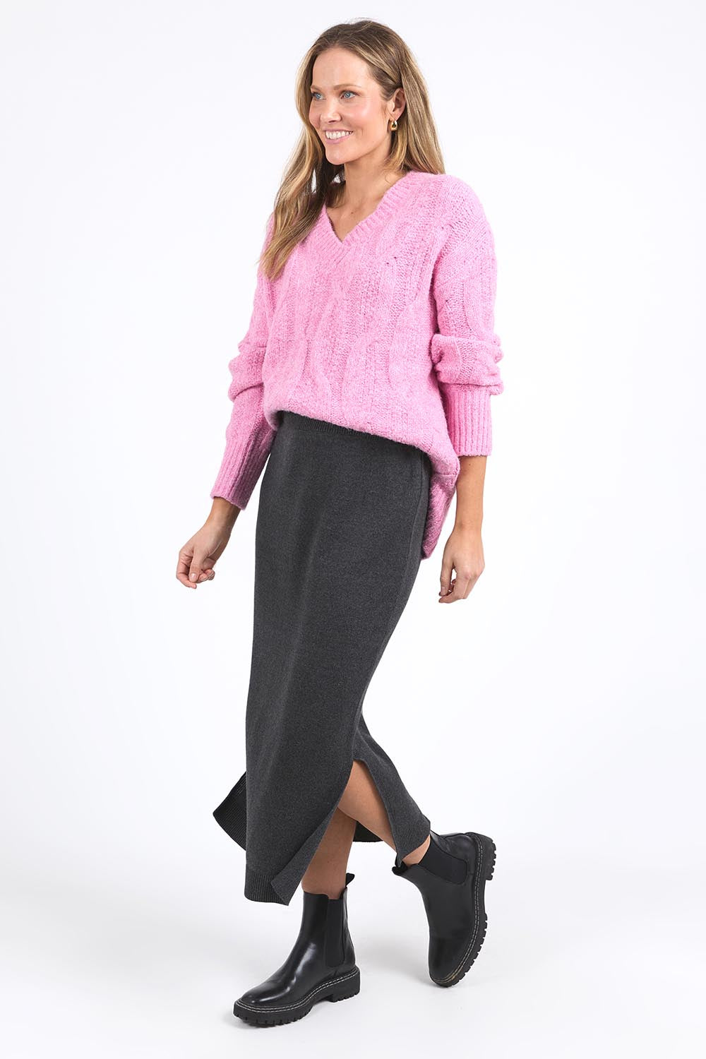 A model wearing the Elodie Cotton Blend Knit Skirt in colour Charcoal (Grey), from the front, showing the whole outfit