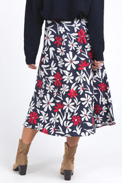 A model wearing the Indie Floral Lyocell Linen Skirt in colour Indieprint, from the back