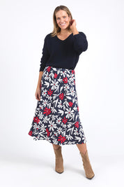 A model wearing the Indie Floral Lyocell Linen Skirt in colour Indieprint, from the front, showing the whole outfit