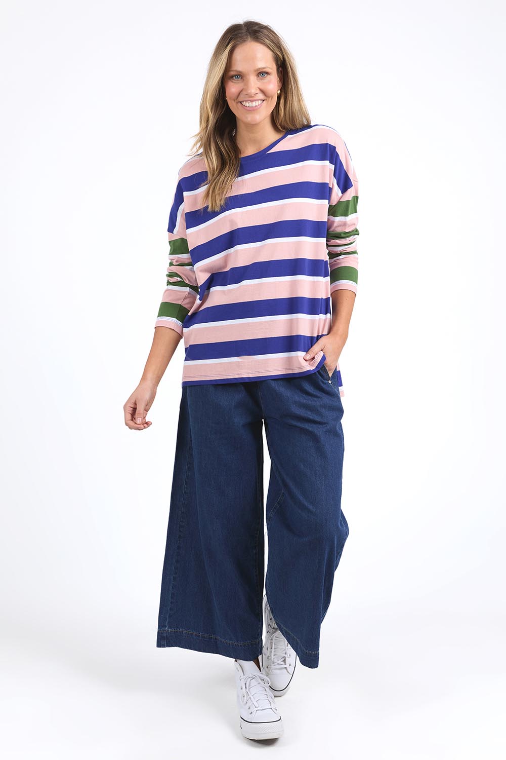 A model wearing the Ribbon Long Sleeve Cotton Tee in colour Pinkblue, from the front, showing the whole outfit