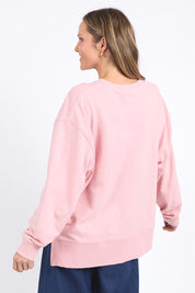 A model wearing the Sketch Cotton Crew in colour Pinkblush (Pink), from the back