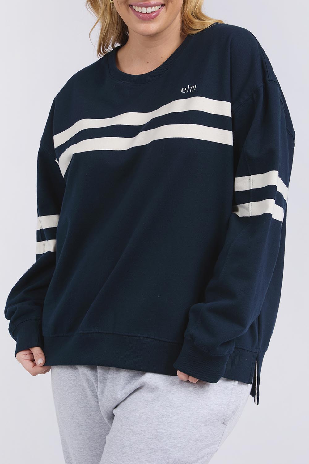 A model wearing the Adora Cotton Blend Crew in colour Drksapphir (Blue), from the front, cropped image