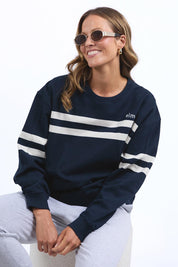 A model wearing the Adora Cotton Blend Crew in colour Drksapphir (Blue), from the front, cropped image