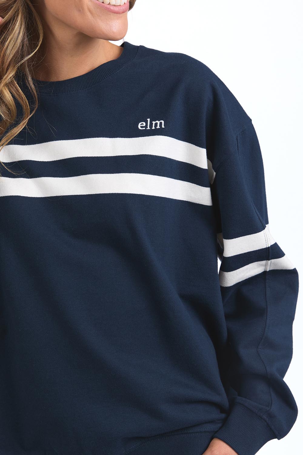 A model wearing the Adora Cotton Blend Crew in colour Drksapphir (Blue), from the front, cropped image