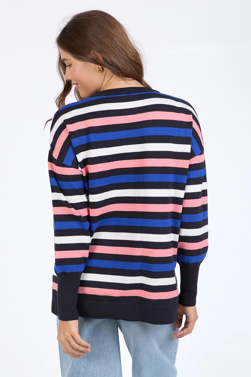A model wearing the Logan Stripe Knit in colour Navy (Blue), from the back