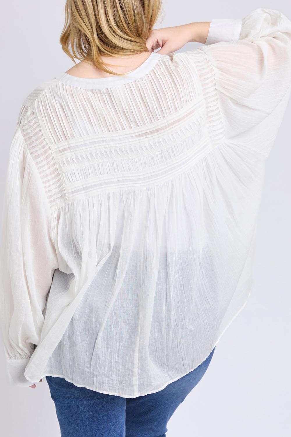 A model wearing the Montana Cotton Blouse in colour Marshmello (White), from the back