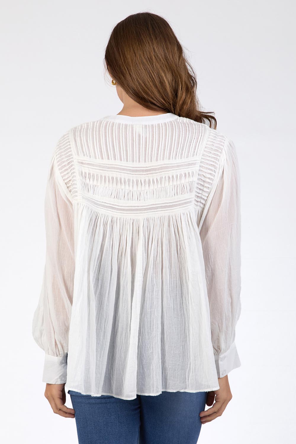 A model wearing the Montana Cotton Blouse in colour Marshmello (White), from the back