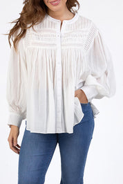 A model wearing the Montana Cotton Blouse in colour Marshmello (White), from the front, cropped image