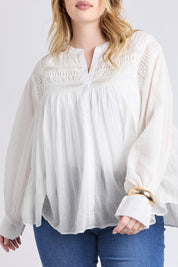 A model wearing the Montana Cotton Blouse in colour Marshmello (White), from the front, cropped image