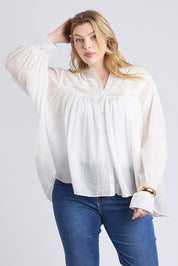 A model wearing the Montana Cotton Blouse in colour Marshmello (White), from the front, cropped image