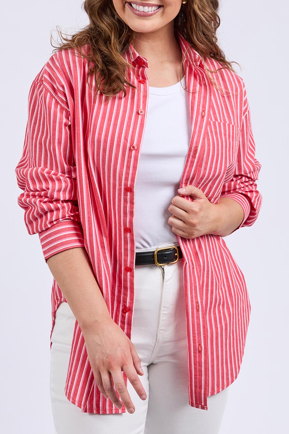 A model wearing the Frankie Striped Cotton Shirt in colour Cayenestri (Red), from the front, cropped image