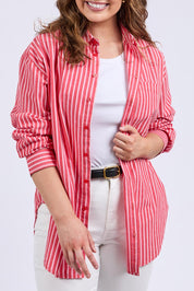 A model wearing the Frankie Striped Cotton Shirt in colour Cayenestri (Red), from the front, cropped image