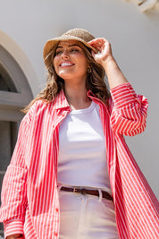 A model wearing the Frankie Striped Cotton Shirt in colour Cayenestri (Red), from the front, showing the whole outfit