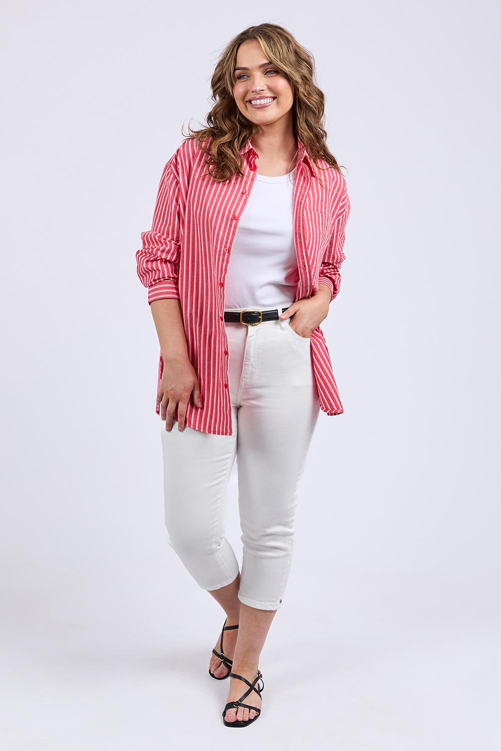 A model wearing the Frankie Striped Cotton Shirt in colour Cayenestri (Red), from the front, showing the whole outfit