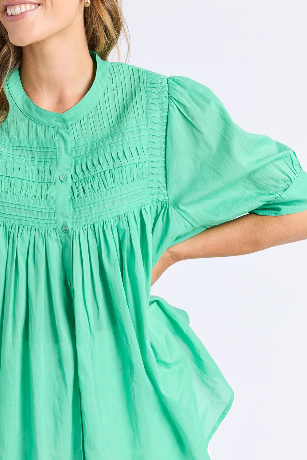 A model wearing the Monty Cotton Short Sleeve Shirt in colour Gumdrop (Green), from the front, cropped image