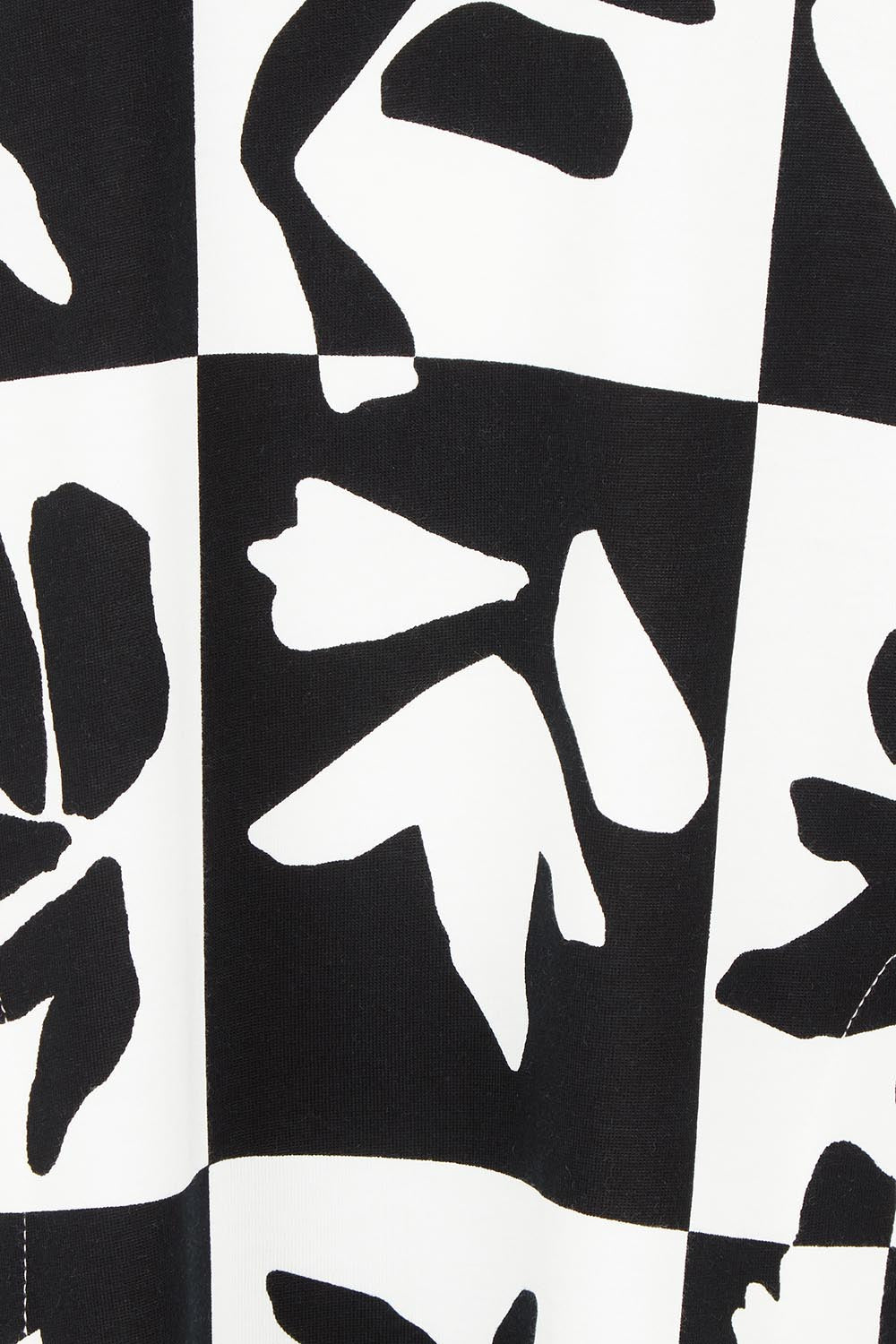 Product shot of the Splice Cotton Dress in colour Blackwhite, detail