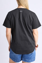 A model wearing the Casa Cotton Tee in colour Black (Black), from the back