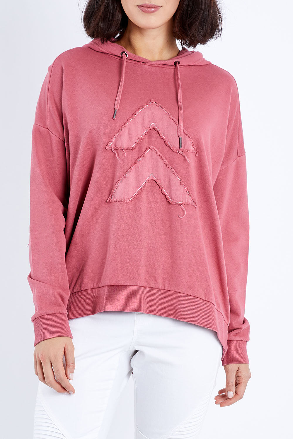 Model Andrea wearing size 10 of the Chevron Hoody in colour Drose (Pink), from the front, cropped image