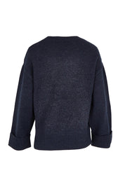 Product shot of the Intersia Heart Knit in colour Navy (Blue), from the back