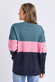A model wearing the Cory Stripe Knit in colour Multi, from the back
