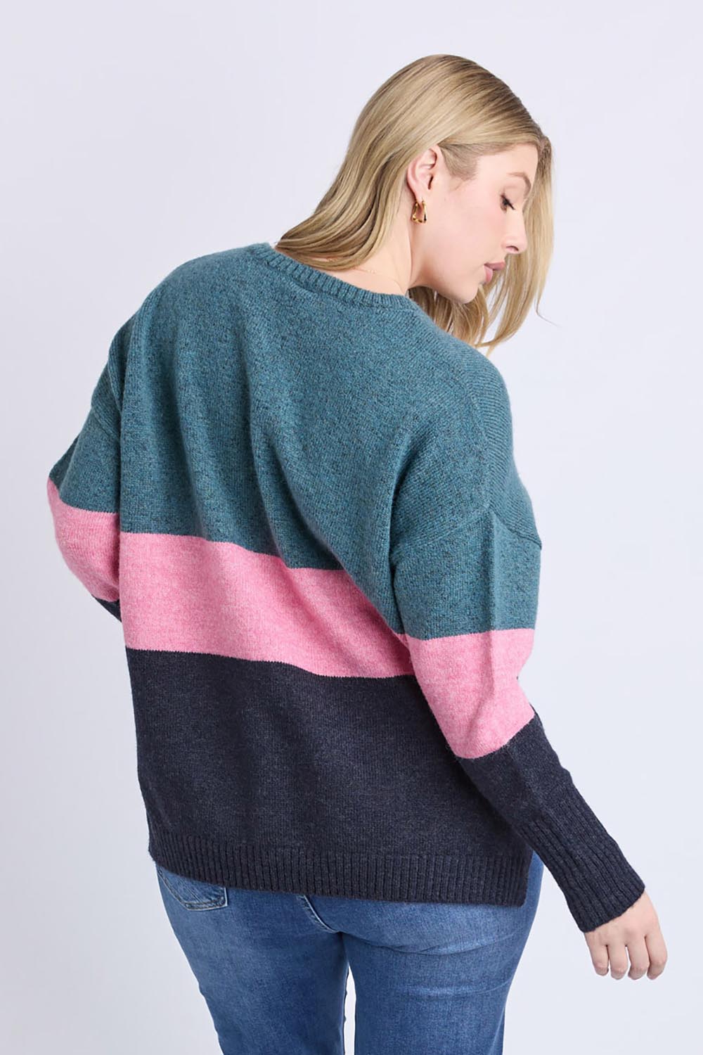 A model wearing the Cory Stripe Knit in colour Multi, from the back