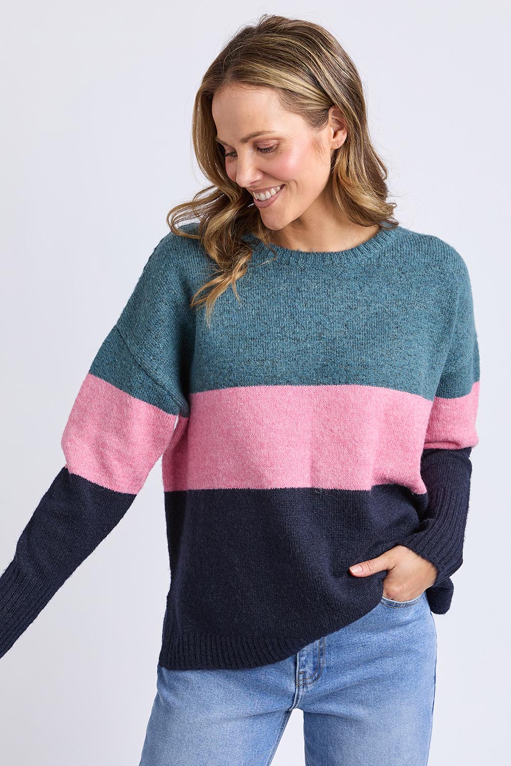 A model wearing the Cory Stripe Knit in colour Multi, from the front, cropped image