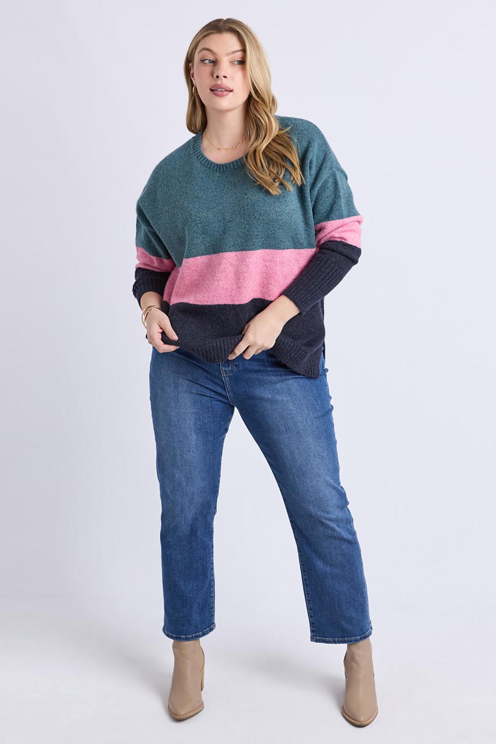 A model wearing the Cory Stripe Knit in colour Multi, from the front, showing the whole outfit