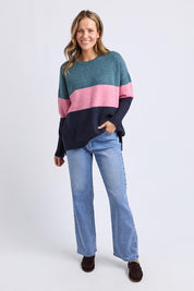 A model wearing the Cory Stripe Knit in colour Multi, from the front, showing the whole outfit