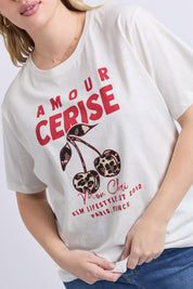 A model wearing the Amore Cerise Cotton Tee in colour Marshmello (White), from the front, cropped image