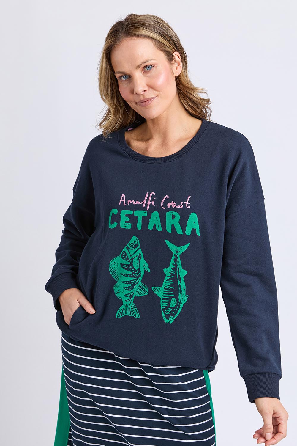 A model wearing the Cetara Crew in colour Navy (Blue), from the front, cropped image