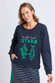 A model wearing the Cetara Crew in colour Navy (Blue), from the front, cropped image