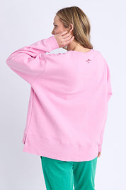 Model Genericm wearing size sample of the Deb Mcnaughton Crew – Prettypink in colour Prettypink, from an angle