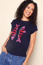 Model Pamelar wearing size 10 of the Fishy Intersia Vest – Chinablue in colour Chinablue, from an angle