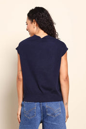 Model Pamelar wearing size 10 of the Fishy Intersia Vest – Chinablue in colour Chinablue, from the back
