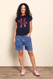 Model Pamelar wearing size 10 of the Fishy Intersia Vest – Chinablue in colour Chinablue, from the front