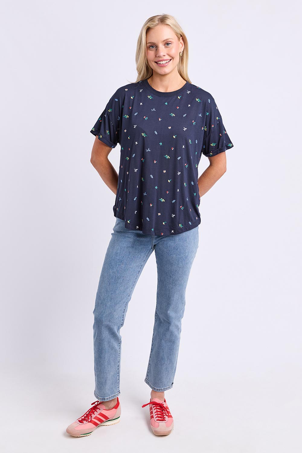 Model Genericm wearing size sample of the Festive Market Tee – Navy in colour Navy, from the front