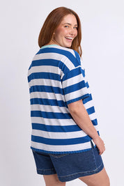 Model Genericm wearing size sample of the Cherry Cotton Tee – Chinablue in colour Chinablue, from an angle