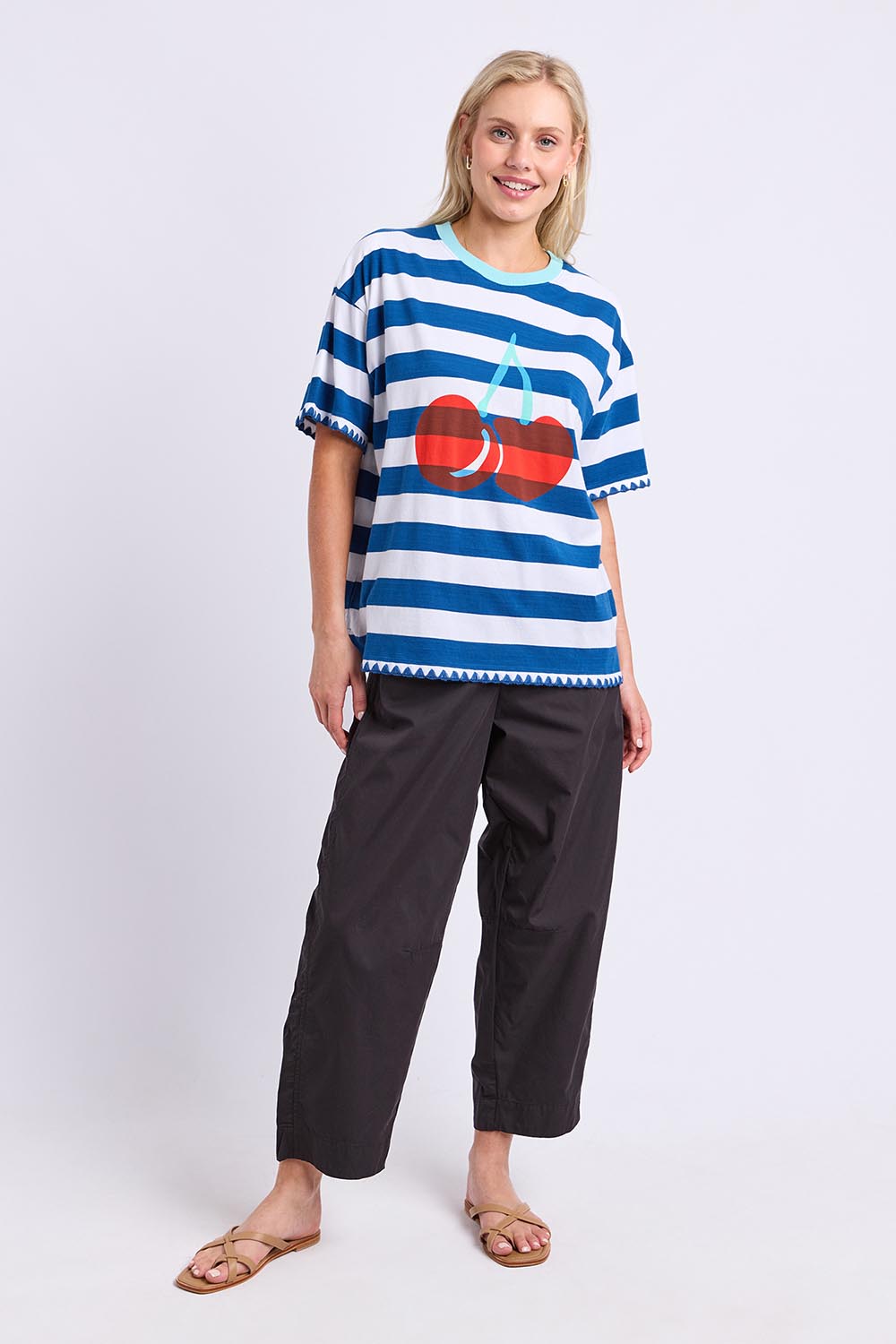 Model Genericm wearing size sample of the Cherry Cotton Tee – Chinablue in colour Chinablue, from the front