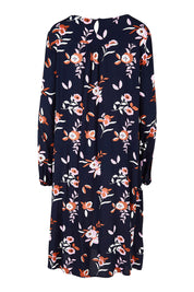 Product shot of the Sloanne Floral Dress in colour Navy (Blue), from the back