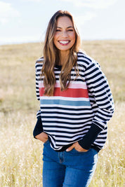 Model Amanda wearing size 10 of the Kayla Crew in colour Navystri (Blue), from the front, showing the whole outfit