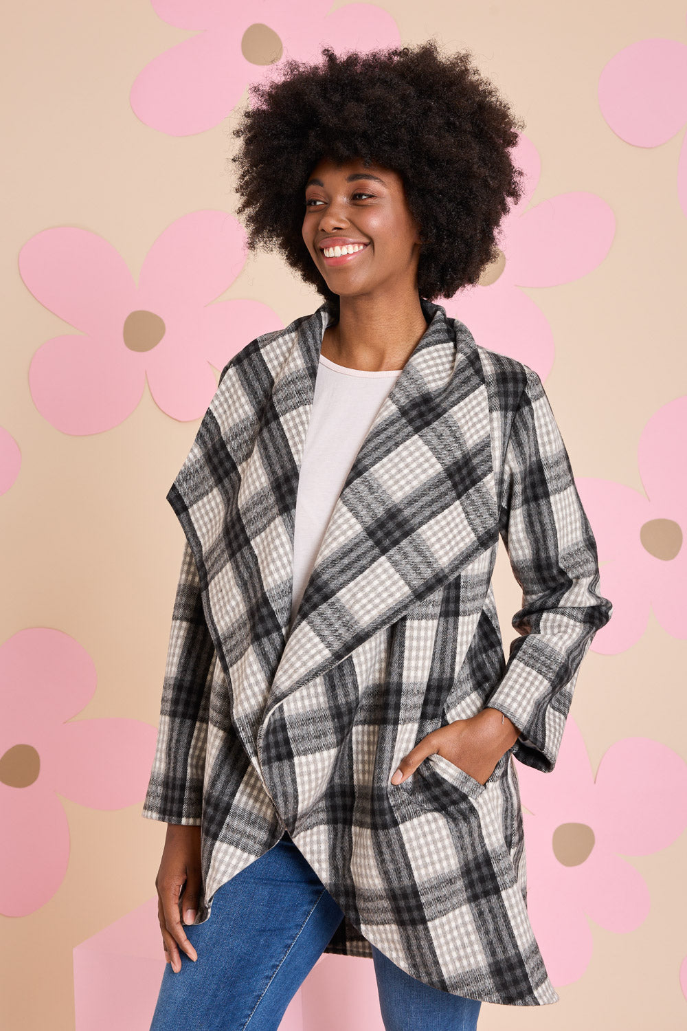 Model Aiyana wearing size S of the Cindy Check Coat in colour Charcoal (Grey), from the front, showing the whole outfit