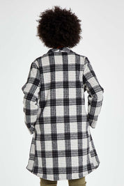 Model Olivia wearing size S of the Cindy Check Coat in colour Charcoal (Grey), from the back